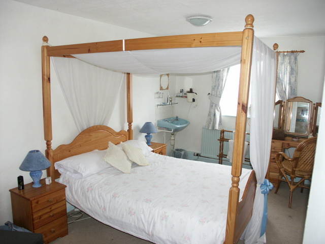 Four Poster Bed